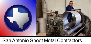 San Antonio, Texas - a sheet metal worker fabricating a metal tube