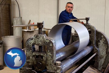 a sheet metal worker fabricating a metal tube - with Michigan icon