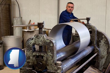 a sheet metal worker fabricating a metal tube - with Mississippi icon